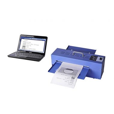 Image of the Piaf tactile embosser beside a laptop computer.